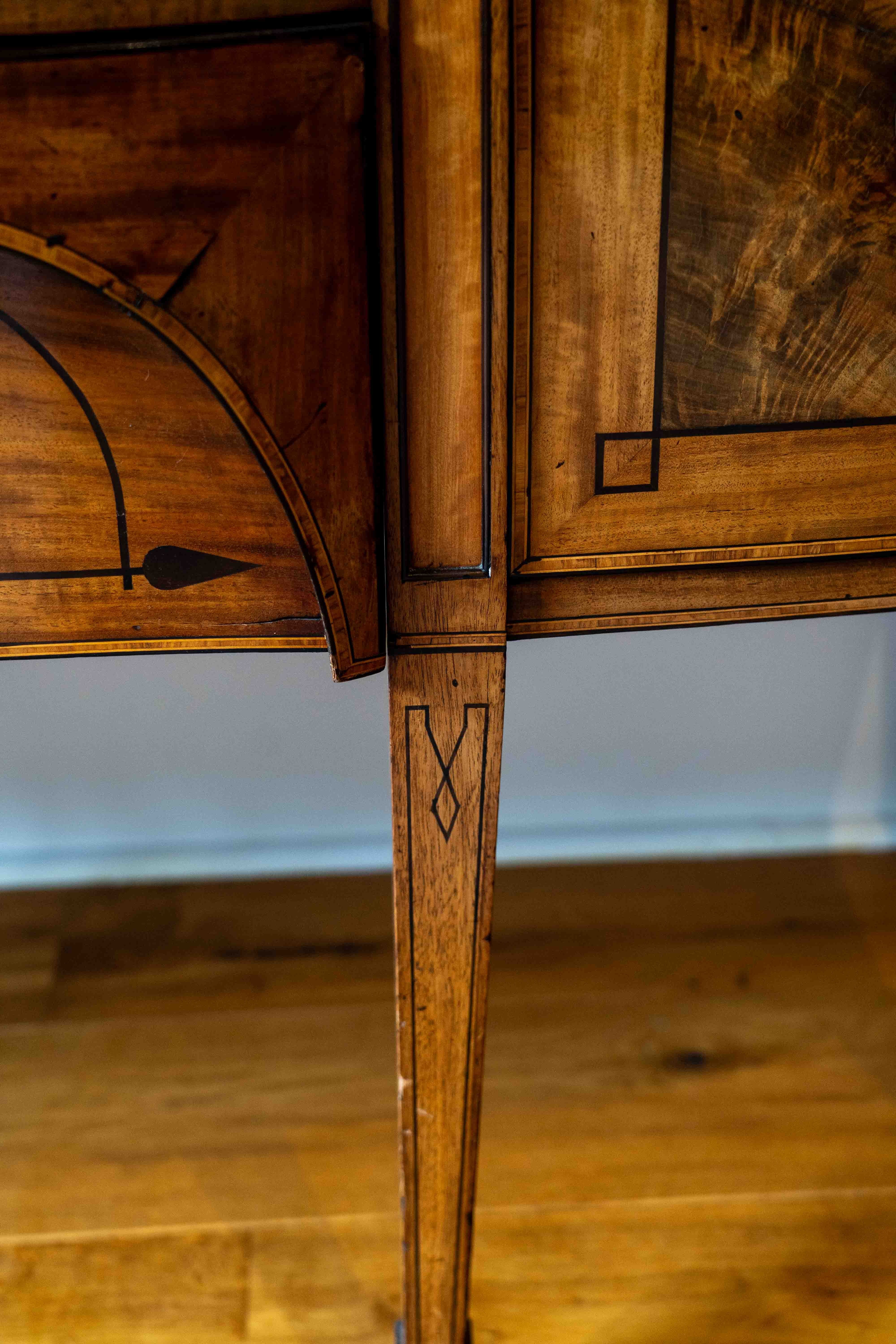 A Regency mahogany bowfront sideboard, width 182cm, depth 74cm, height 94cm. Condition - fair